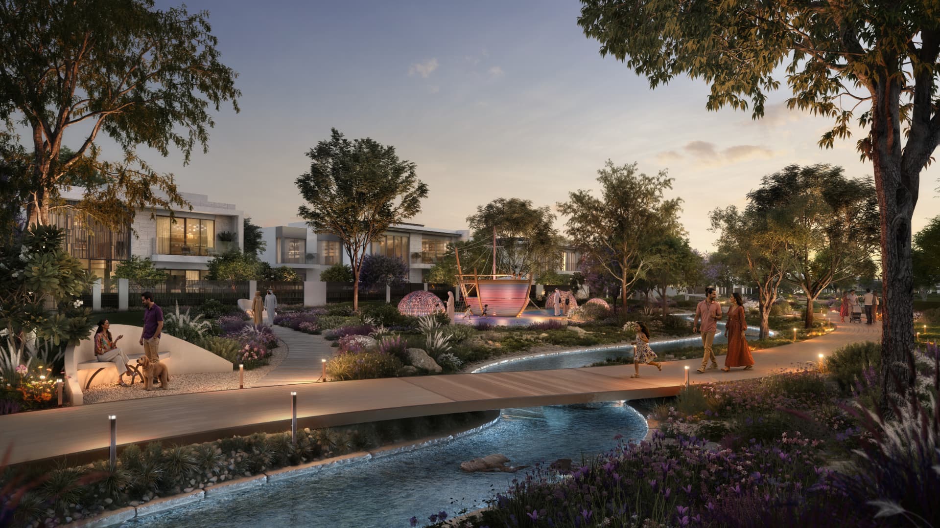 Landscaped promenade and water channels at Talay, Marsa Al Saadiyat, at dusk